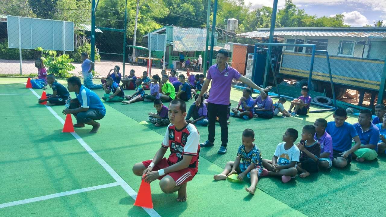 A coaching session with the whole group on the pitch
